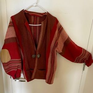 Thrifted 1970s sweater with antique silver buttons.